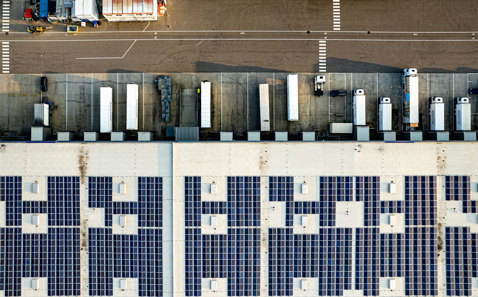 Aerial view of trucks at a distribution center loading docks